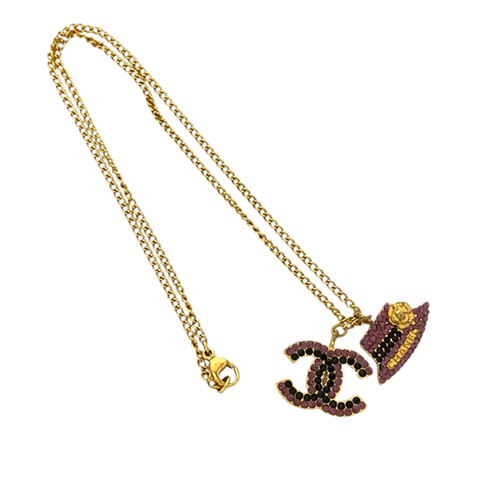 Chanel Camellia Hat and CC Rhinestone Pendant Gold Plated Necklace: Chanel Camellia Hat and CC Rhinestone Pendant Gold Plated Necklace This Chanel necklace features gold plated metal with rhinestone-embellished CC and Camellia hat pendants. The necklace is secured wit