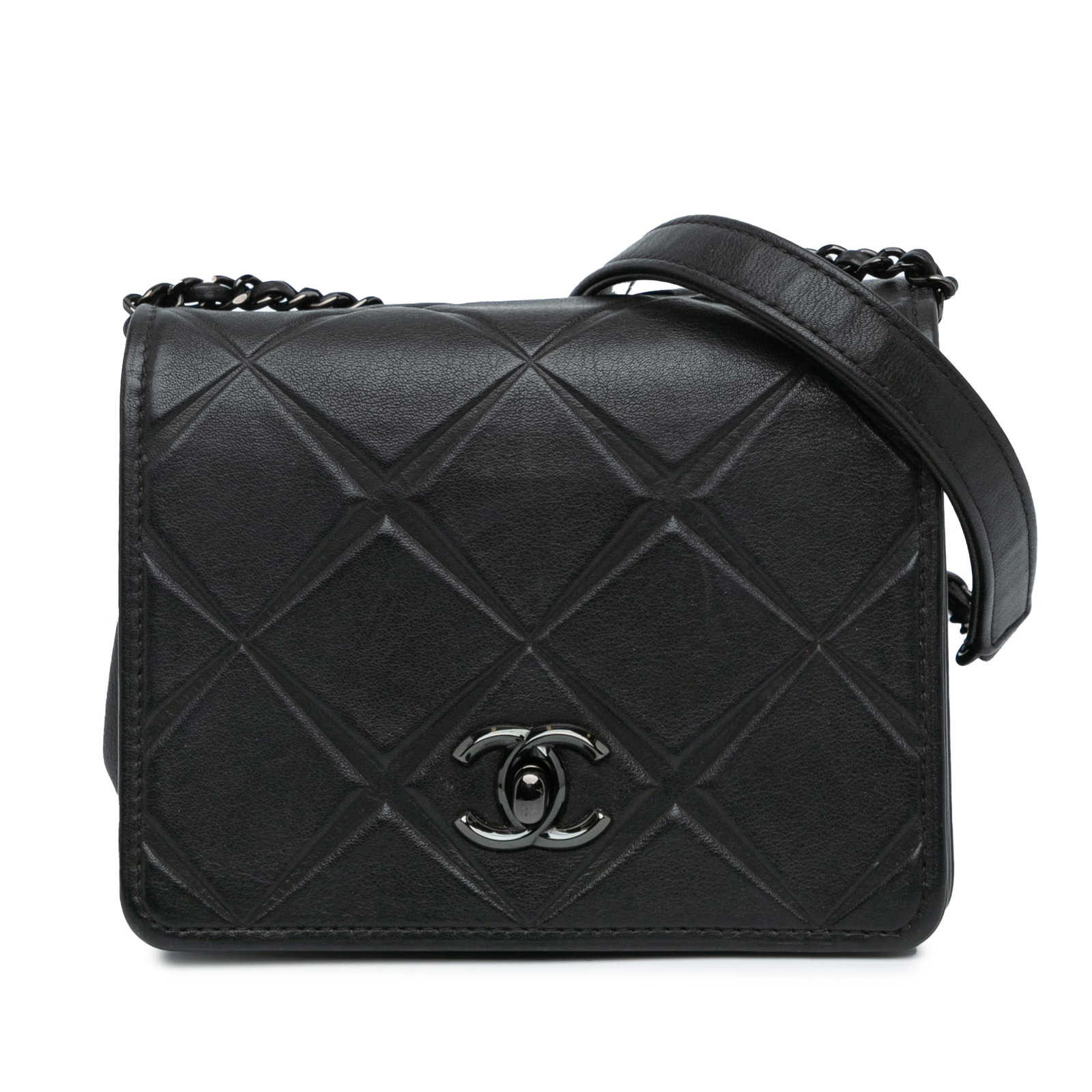 Chanel Mini Calfskin Propeller Flap Black Leather Bag: Chanel Mini Calfskin Propeller Flap Black Leather Bag Introducing the Chanel Mini Calfskin Propeller Flap, a sophisticated accessory crafted from luxurious quilted calf leather in a timeless black col