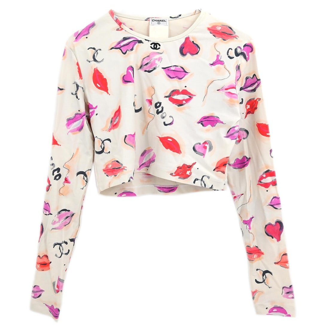 Chanel Vintage White Long Sleeve Cropped T-Shirt #44: Chanel Vintage White Long Sleeve Cropped T-Shirt #44 Elevate your casual wardrobe with this vintage Chanel Lipstick Cropped T-shirt Top in a pristine white color. Featuring long sleeves and a round ne