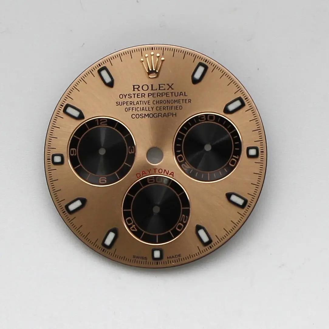 Rolex Daytona Cosmograph Rose Pink Sundust Dial 116505 Luxury Swiss: Rolex Daytona Cosmograph Rose Pink Sundust Dial 116505 Luxury Swiss Experience the luxury of this pre-owned Rolex Daytona Cosmograph dial, featuring an elegant rose pink sundust finish. This 12-hour d