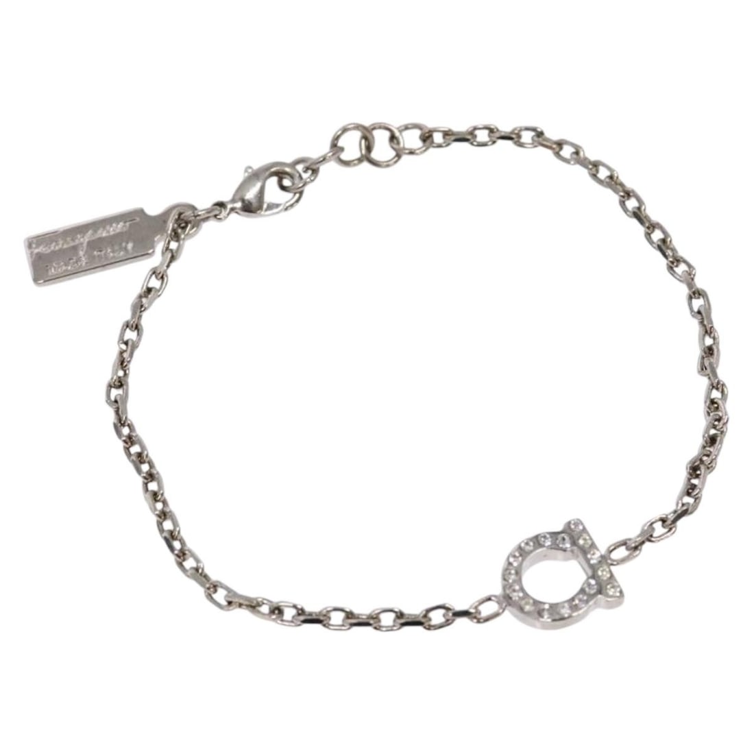Salvatore Ferragamo Silver Gancini Bracelet Metal Authentic: Salvatore Ferragamo Silver Gancini Bracelet Metal Authentic Presenting a stylish Salvatore Ferragamo Gancini Bracelet, expertly crafted in Italy. This exquisite piece is made from high-quality metal w