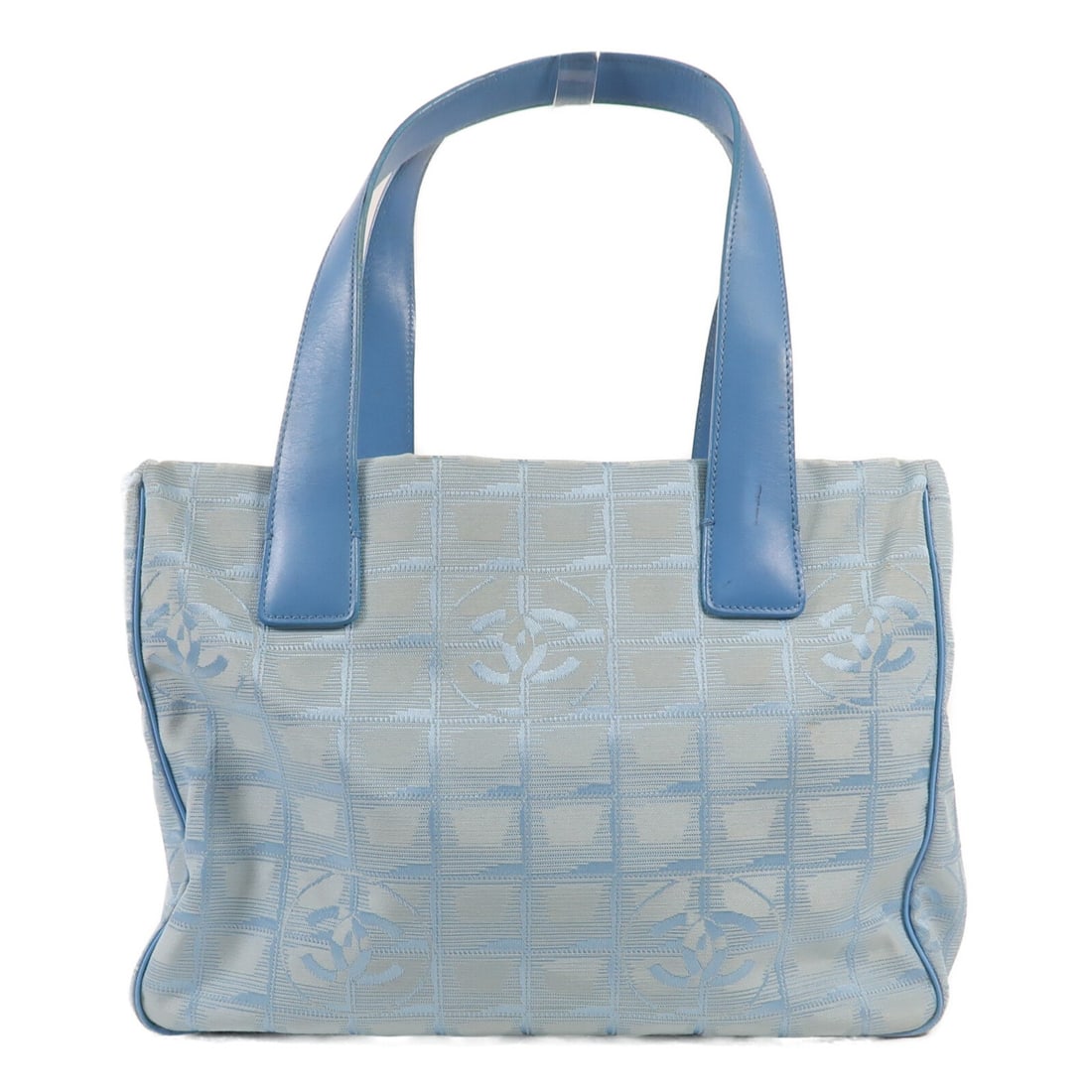 CHANEL CC Blue Nylon Travel Tote Bag Made in France: CHANEL CC Blue Nylon Travel Tote Bag Made in France This CHANEL CC New Travel Line Tote Bag is a stylish and functional accessory made from durable nylon in a classic blue color. Its spacious interior