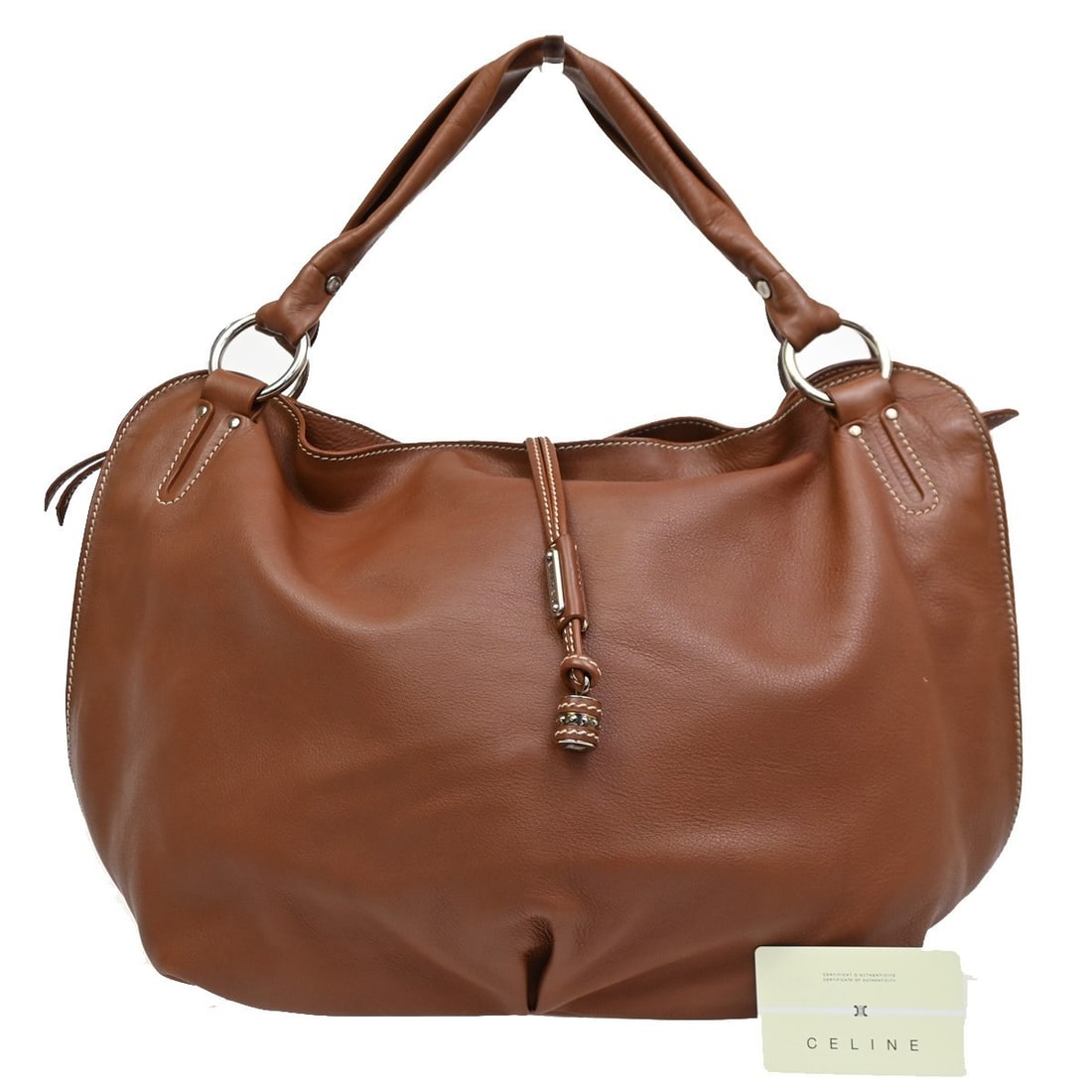Brown Leather Handbag by Celine Bittersweet 44cm x 35cm x 15cm: Brown Leather Handbag by Celine Bittersweet 44cm x 35cm x 15cm This pre-owned Celine Bittersweet handbag for women is crafted from brown leather and features a spacious design. It shows noticeable sig
