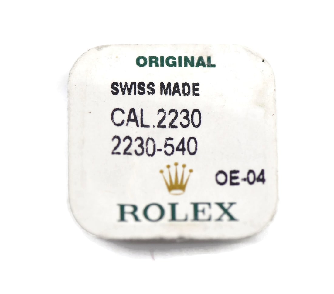 Reversing Wheel Movement Component for Rolex Caliber 2230-540: Reversing Wheel Movement Component for Rolex Caliber 2230-540 This is a pre-owned Rolex Caliber 2230-540 reversing wheel, a genuine movement part manufactured in Switzerland. Crafted for precision, th