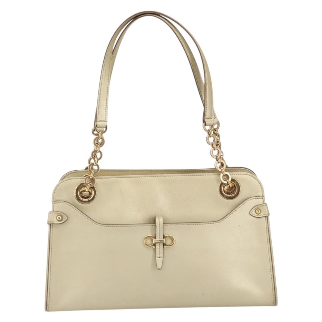 Gancini gold leather handbag by Salvatore Ferragamo: Gancini gold leather handbag by Salvatore Ferragamo This Salvatore Ferragamo Gancini handbag is crafted from leather in a gold color, designed for women. The bag features signs of surface rubbing, sta