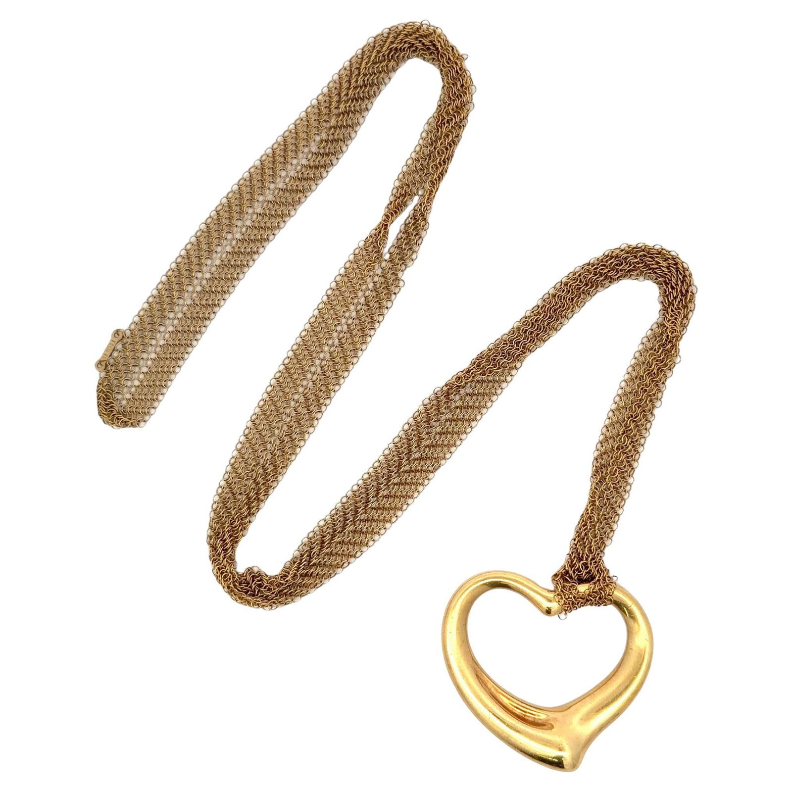 Elsa Peretti Open Heart Pendant Necklace in 18K Gold with 28 Inch Mesh Chain: Elsa Peretti Open Heart Pendant Necklace in 18K Gold with 28 Inch Mesh Chain This authentic Tiffany & Co. Elsa Peretti Open Heart necklace is crafted from solid 18K yellow gold and features the signat