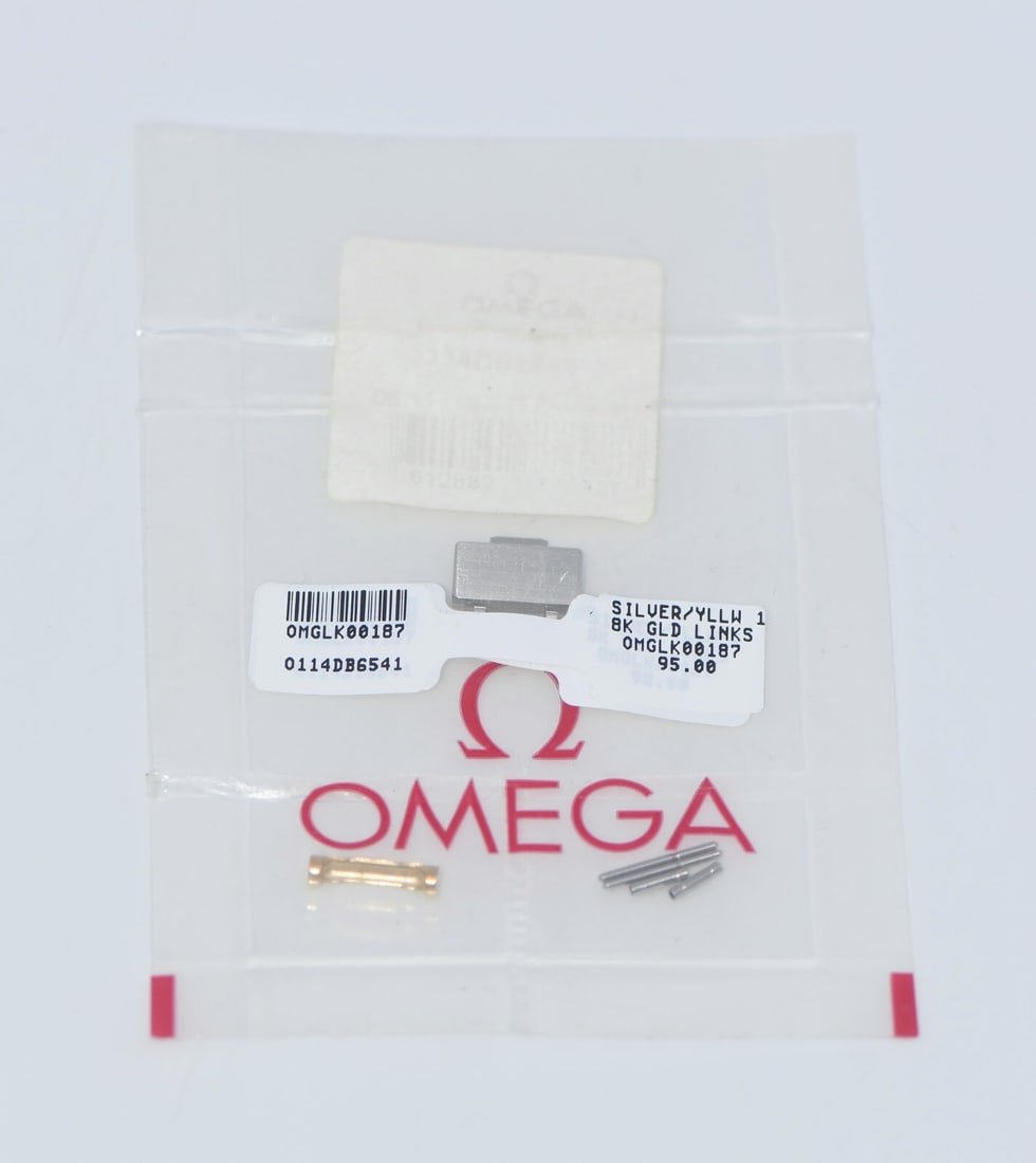 Omega 18K Gold and Stainless Steel 12mm Band Link Authentic: Omega 18K Gold and Stainless Steel 12mm Band Link Authentic This Omega link band is crafted from a combination of 18K gold and stainless steel, offering a luxurious yet durable accessory for your time