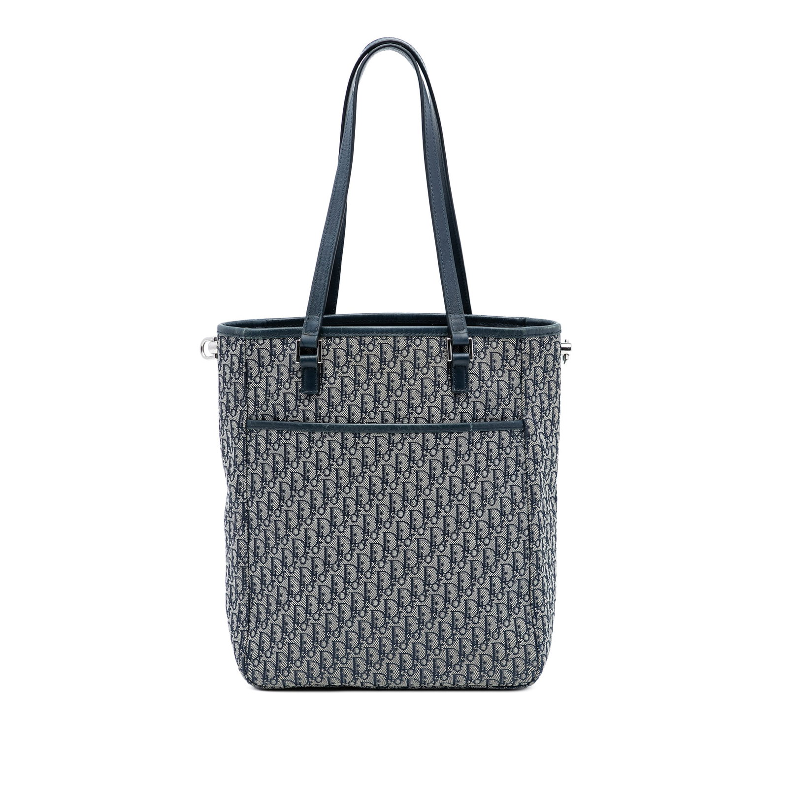 Dior Diorissimo Trotter Blue Canvas Shoulder Tote Bag: Dior Diorissimo Trotter Blue Canvas Shoulder Tote Bag This Diorissimo Trotter Canvas Tote features a blue canvas body with flat shoulder straps, an open top, and an interior zip pocket. The bag shows