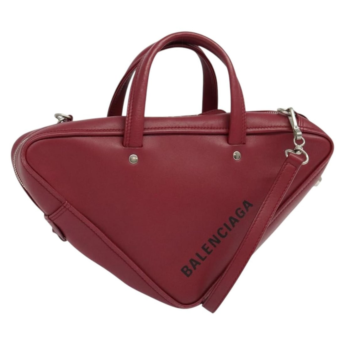 Red Balenciaga Leather Triangle Duffle Bag Purse: Red Balenciaga Leather Triangle Duffle Bag Purse This Balenciaga Triangle Duffle Bag features a striking red leather exterior, designed specifically for women. Crafted in Italy, the bag showcases Bale