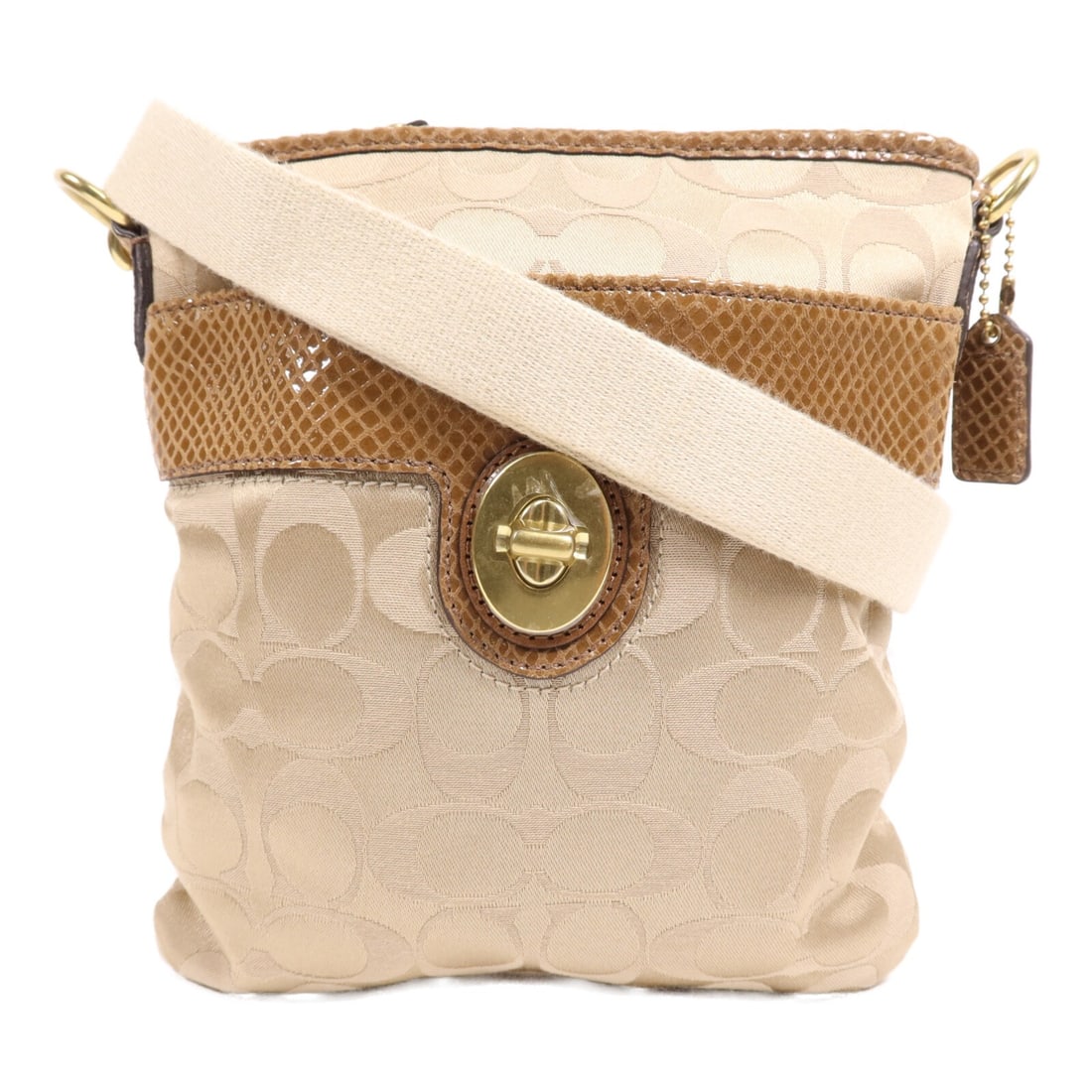 COACH GHW Brown Canvas Shoulder Bag J0982: COACH GHW Brown Canvas Shoulder Bag J0982 This COACH shoulder bag combines style and functionality with its elegant brown canvas exterior. Designed for everyday use, it features ample space for your e