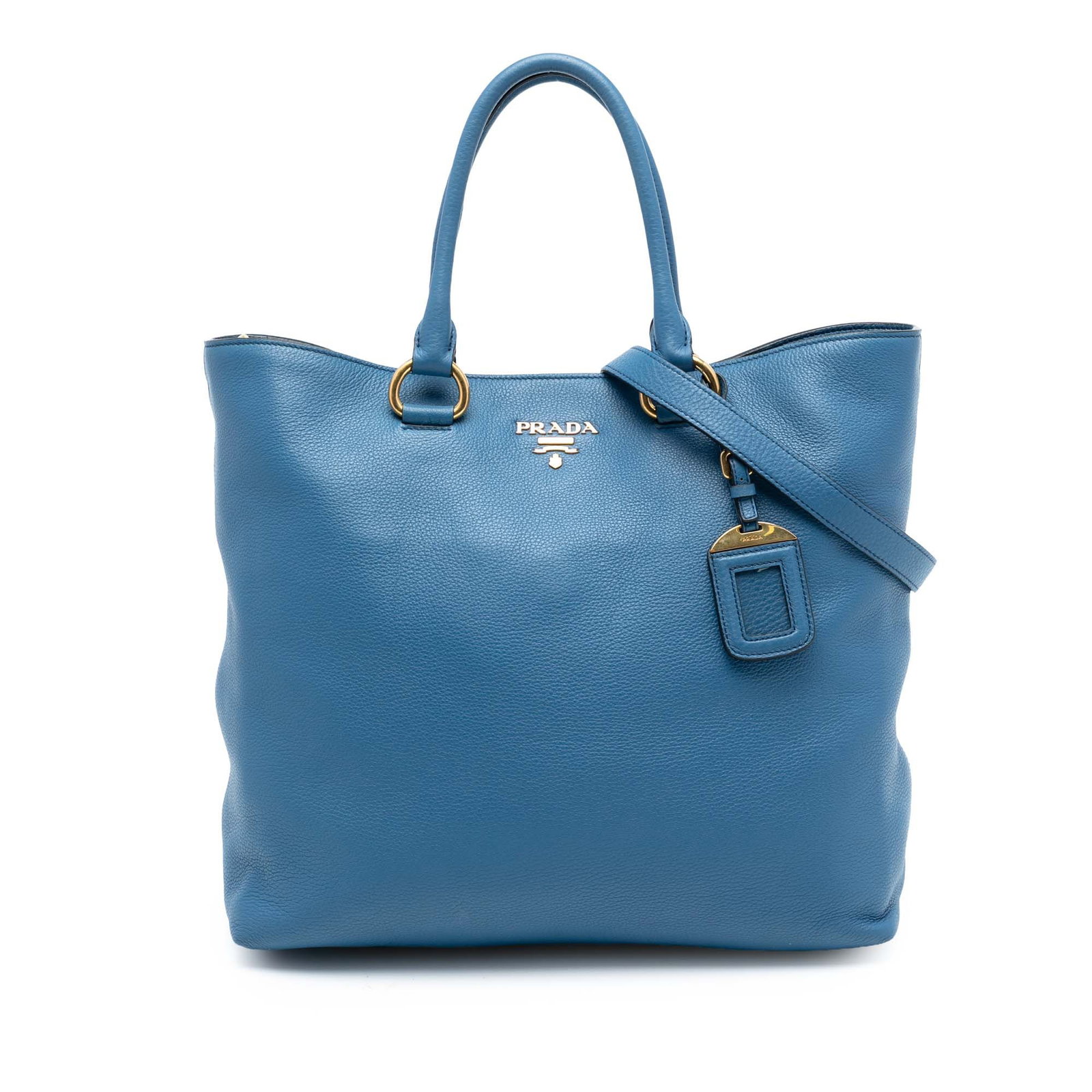 Prada Vitello Daino Blue Leather Convertible Satchel with Detachable Strap: Prada Vitello Daino Blue Leather Convertible Satchel with Detachable Strap This Prada Vitello Daino Open Convertible Tote is crafted from blue leather and features rolled leather handles, a detachable