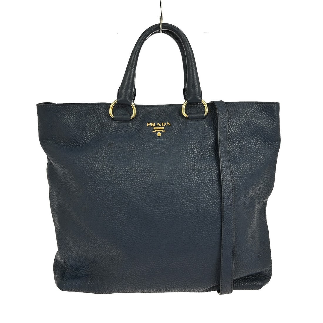 Prada Large Vintage Navy Leather Two Way Top Handle Bag Pink Lining: Prada Large Vintage Navy Leather Two Way Top Handle Bag Pink Lining This Prada navy 2-way handbag features a large top handle design crafted from leather with a button closure. The exterior is navy le