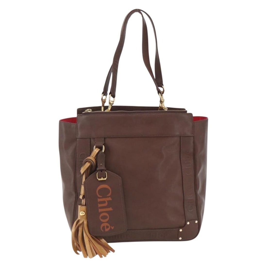 Chloe Eden brown leather women's tote handbag: Chloe Eden brown leather women's tote handbag This Chloe Eden Tote bag is crafted from brown leather and designed for women. The bag features a spacious interior and sturdy handles. It shows signs of 