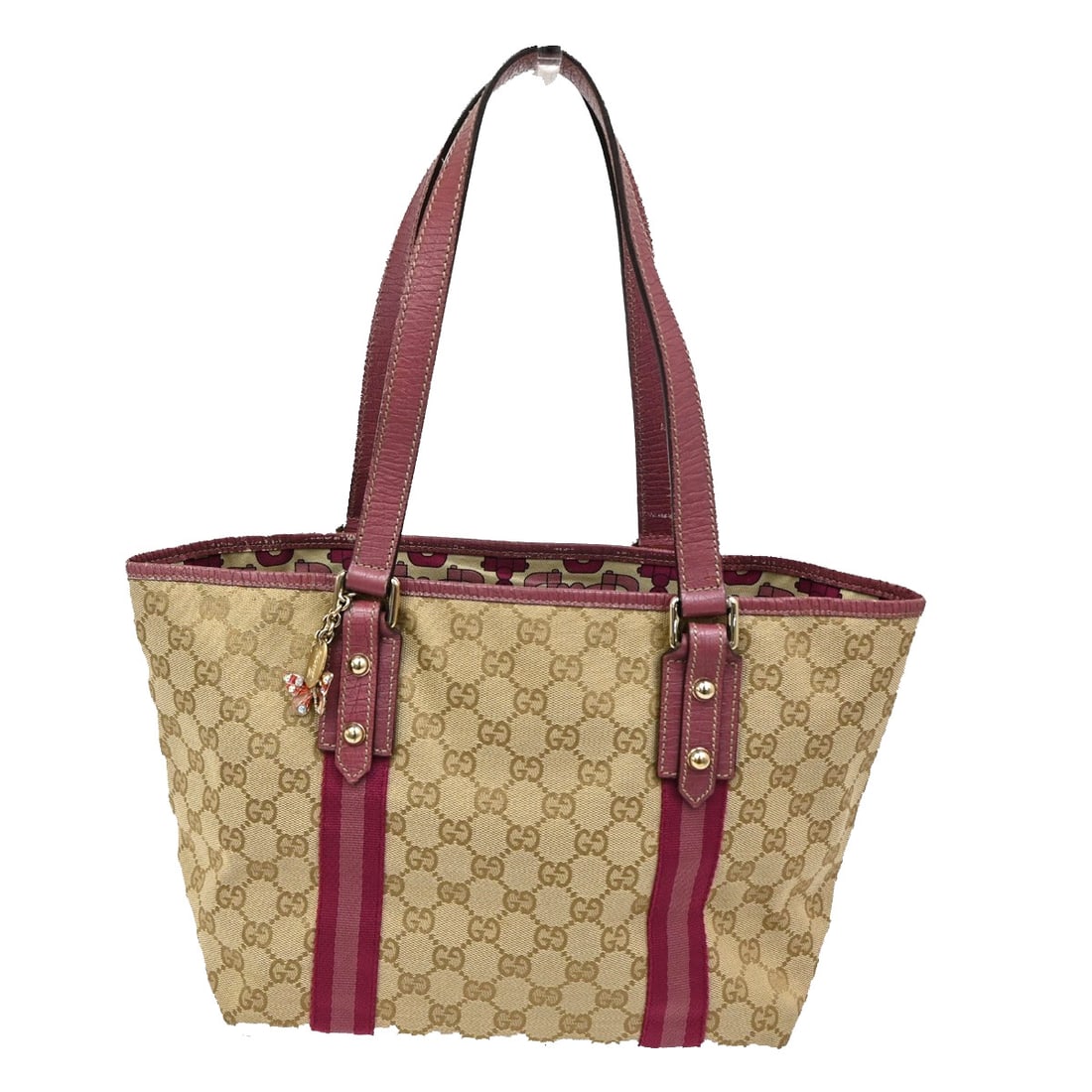 Beige GG Canvas Jolicoeur Tote Bag by Gucci: Beige GG Canvas Jolicoeur Tote Bag by Gucci The Gucci Jolicoeur Tote in GG canvas features a beige color and is crafted for women. Made in Italy, this pre-owned tote displays noticeable signs of use,