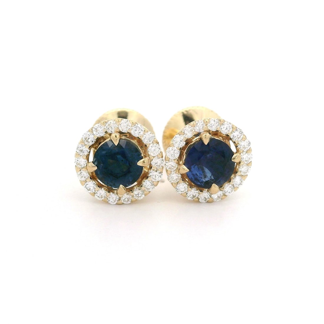 14k Yellow Gold 1.68ctw Sapphire Diamond Halo Stud Earrings: 14k Yellow Gold 1.68ctw Sapphire Diamond Halo Stud Earrings Elevate your jewelry collection with these exquisite 14k Yellow Gold stud earrings featuring a stunning halo design. Each earring showcases 