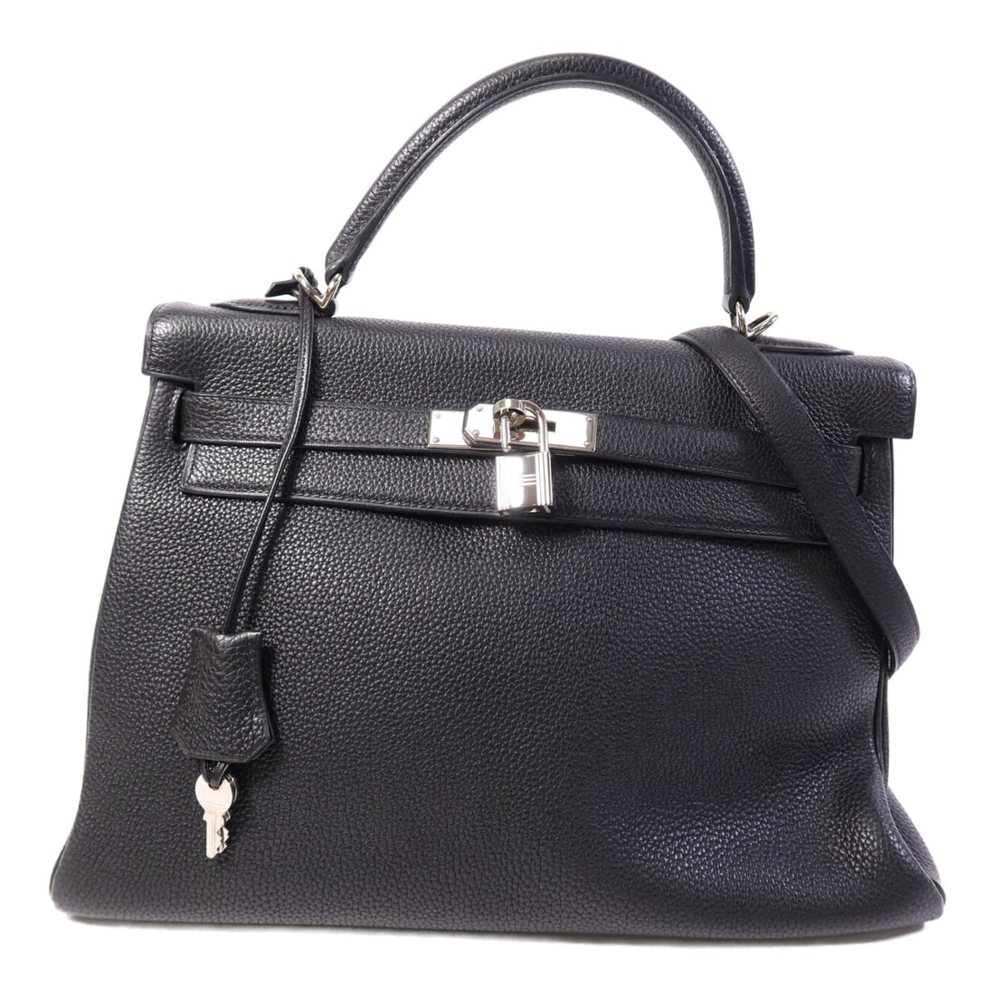 Black Clemence Leather Hermes Kelly 32 PHW Two Way Shoulder Bag: Black Clemence Leather Hermes Kelly 32 PHW Two Way Shoulder Bag This Hermes Kelly 32 is a versatile 2-way shoulder bag crafted from Clemence calfskin leather in classic black. The bag features a struc