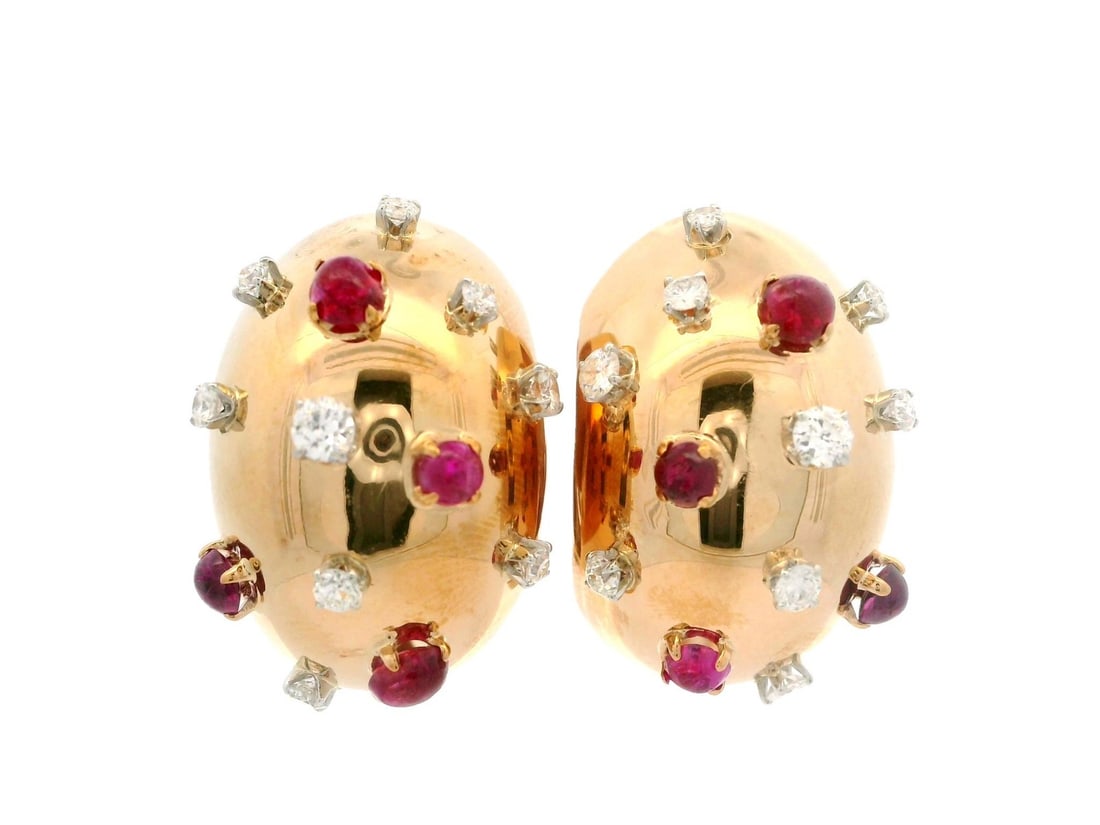 Vintage Cuff Earrings 14k Yellow Gold Ruby Diamond Sputnik Design: Vintage Cuff Earrings 14k Yellow Gold Ruby Diamond Sputnik Design Elevate your accessory collection with these vintage Lackritz cuff earrings, expertly crafted from 14k yellow gold. The earrings featu