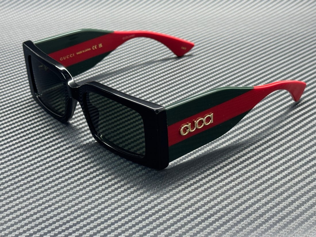 Gucci GG1860S 001 Black Grey Women's Sunglasses 52mm: Gucci GG1860S 001 Black Grey Women's Sunglasses 52mm Elevate your style with these GUCCI GG1860S sunglasses, designed for women. Featuring a sleek black frame paired with grey lenses, these sunglasses