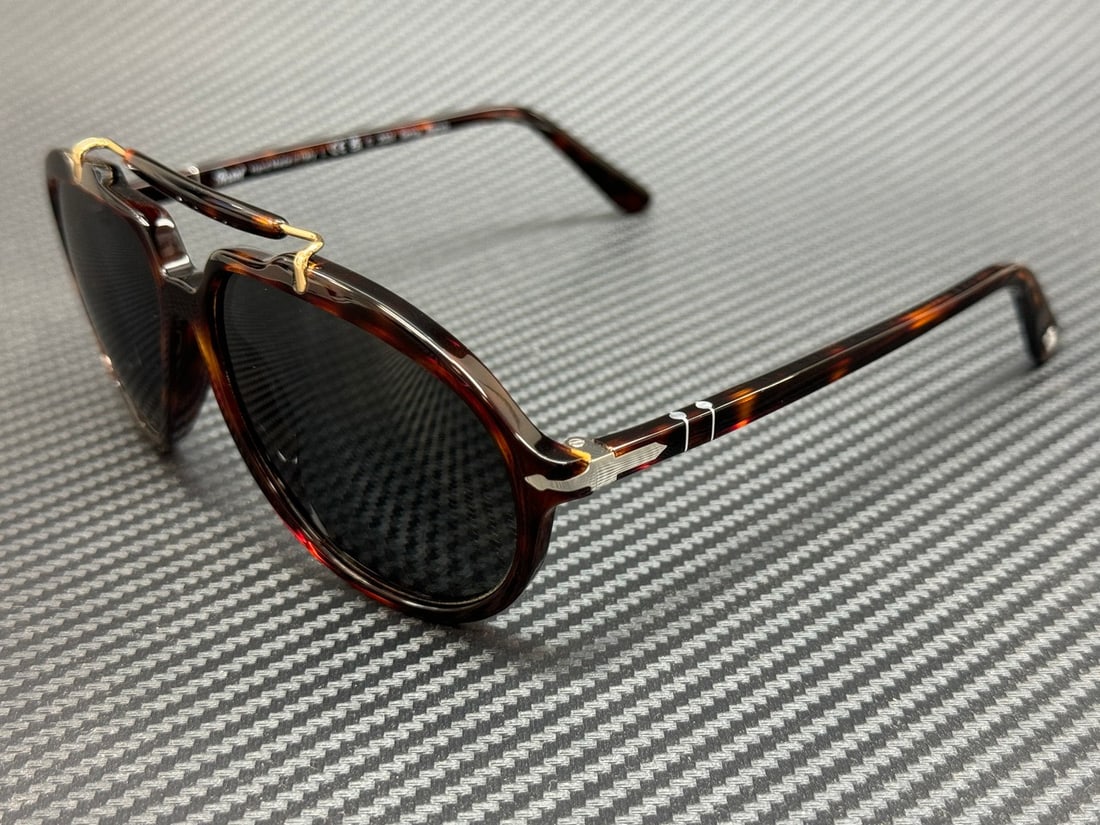 Persol PO0202S 24 48 Havana Brown Black Polarized Sunglasses 57mm: Persol PO0202S 24 48 Havana Brown Black Polarized Sunglasses 57mm Elevate your eyewear collection with these stylish Persol PO0202S sunglasses. Featuring a sophisticated Havana Brown frame paired with