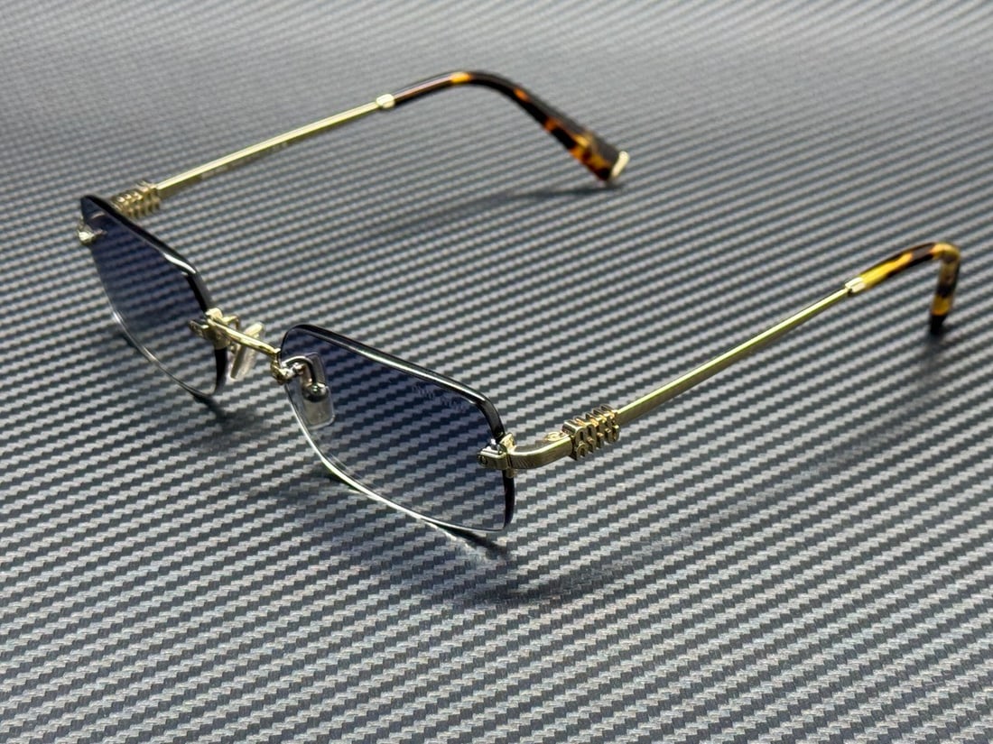 Miu Miu MU B50S ZVN80O 52mm Pale Gold Blue Gradient Women's Sunglasses: Miu Miu MU B50S ZVN80O 52mm Pale Gold Blue Gradient Women's Sunglasses These Miu Miu MU B50S ZVN80O sunglasses feature a pale gold frame with blue gradient lenses. Designed for women, they have a 52 m