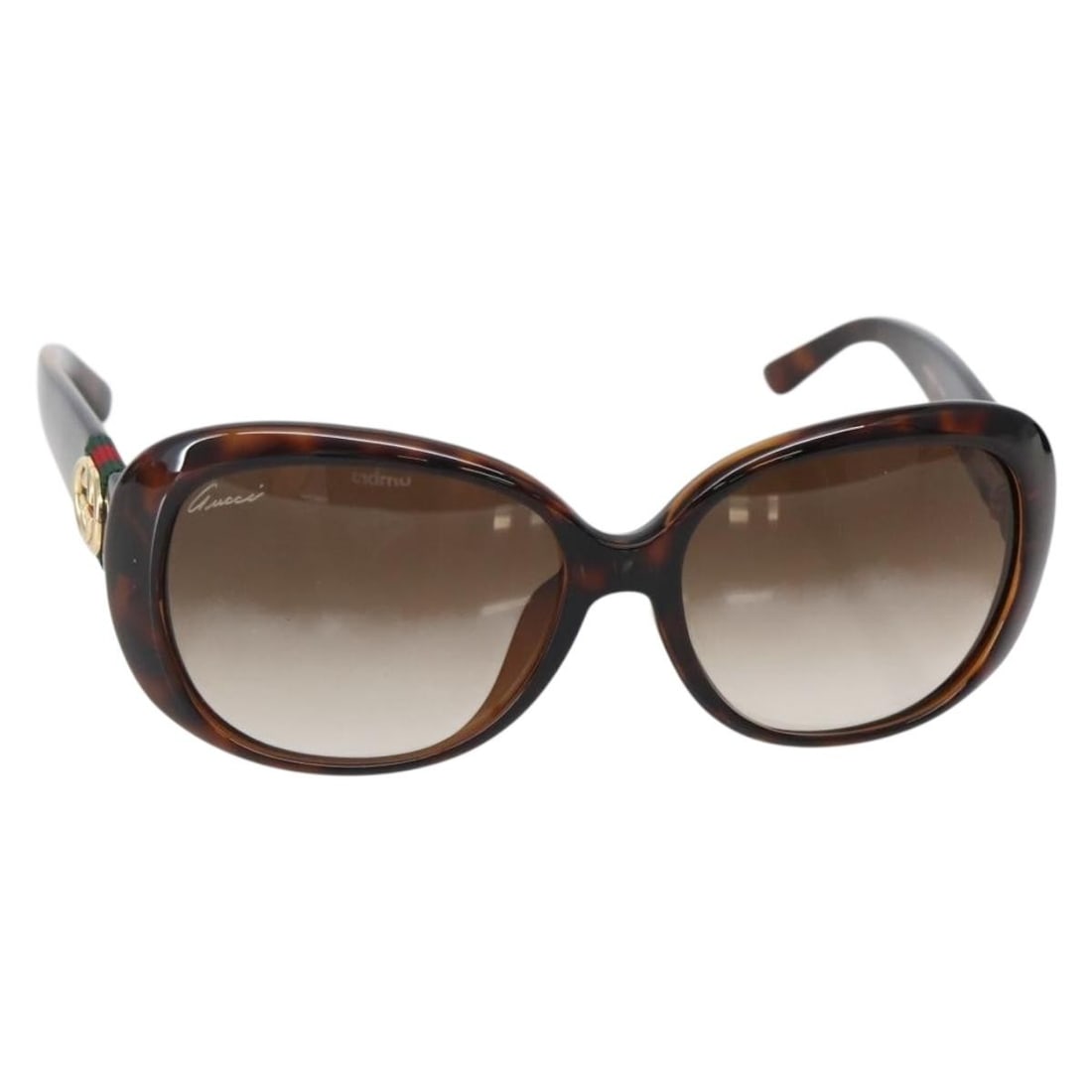 Brown Plastic Gucci Sunglasses with Case Made in Italy: Brown Plastic Gucci Sunglasses with Case Made in Italy These authentic GUCCI sunglasses feature a stylish brown plastic frame. Made in Italy, they come with a matching sunglass case. The sunglasses ar