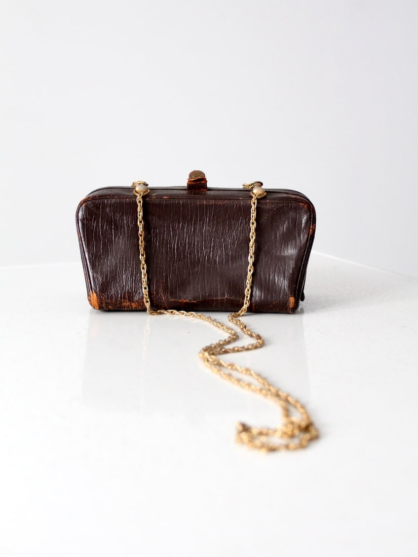 1960s Koret Brown Goatskin Crossbody Bag with Gold Chain Straps: 1960s Koret Brown Goatskin Crossbody Bag with Gold Chain Straps Step back in time with this stylish 1960s vintage Koret crossbody bag, crafted from luxurious brown goatskin. It features a distinctive