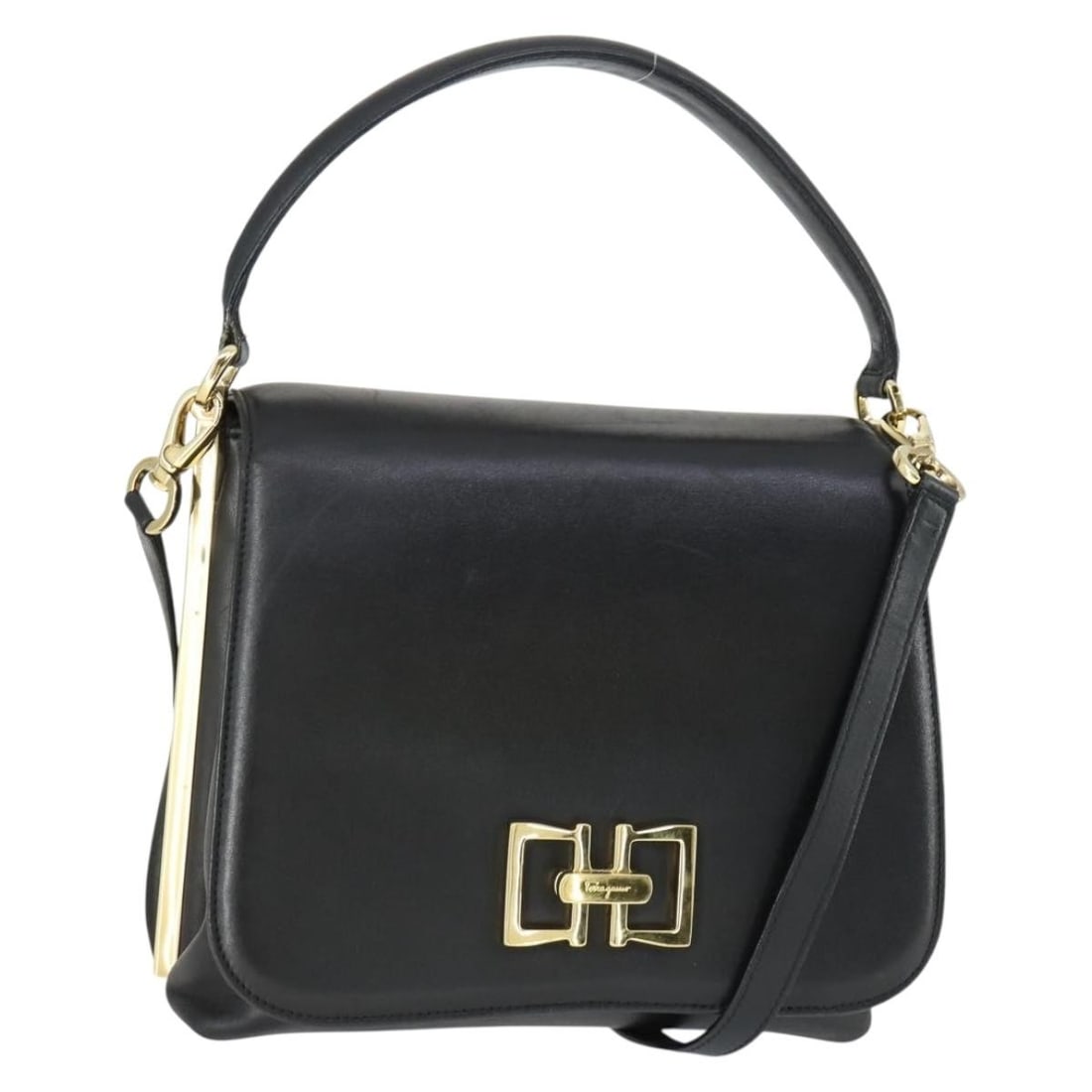 Salvatore Ferragamo Black Leather Two-Way Handbag with Gold Hardware: Salvatore Ferragamo Black Leather Two-Way Handbag with Gold Hardware This Salvatore Ferragamo handbag is crafted from black leather with gold-tone accents and features both a top handle and a detachab