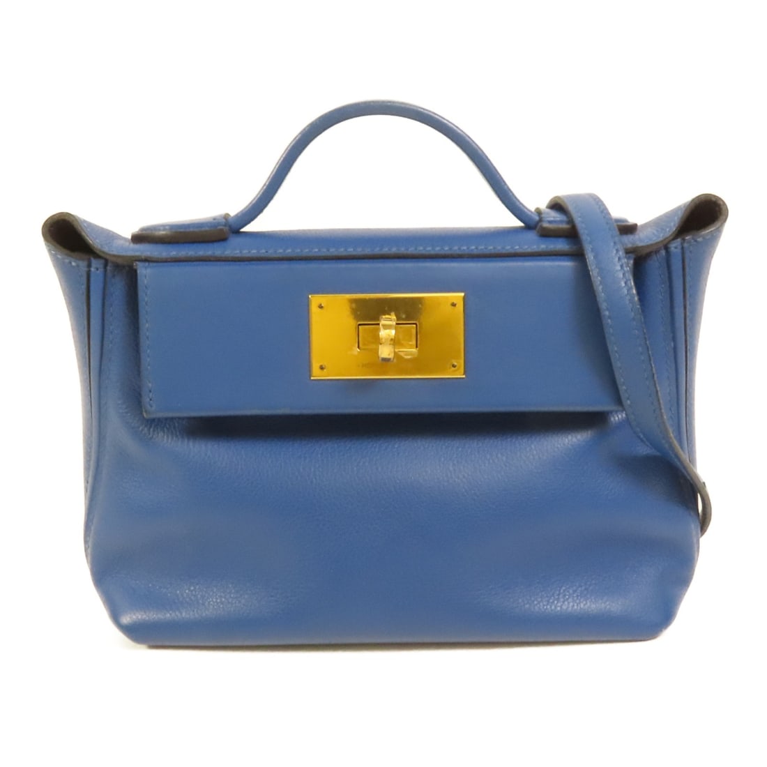 Hermes Mini 24 24 Blue Evercolor Calfskin Two Way Shoulder Bag Gold Hardware: Hermes Mini 24 24 Blue Evercolor Calfskin Two Way Shoulder Bag Gold Hardware This Hermes 24/24 Mini 2-way shoulder bag is crafted from Evercolor calfskin leather in a blue shade. Designed for women, i