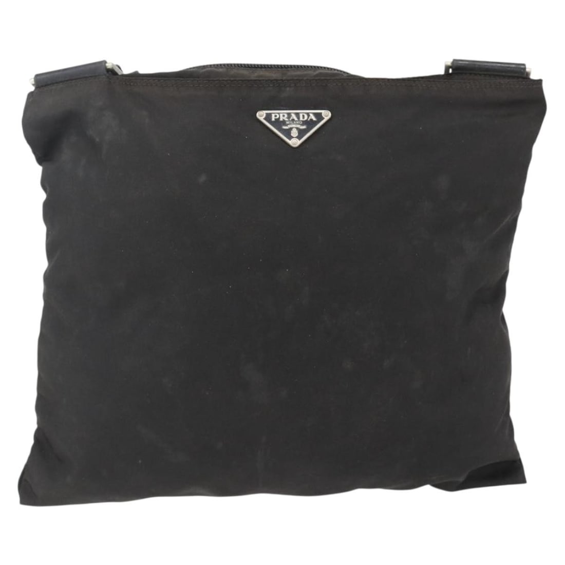 Prada Tessuto Black Nylon Messenger Bag with Zip Closure: Prada Tessuto Black Nylon Messenger Bag with Zip Closure This Prada Zip Top Messenger Bag is crafted from black nylon and designed for unisex use. The bag features a zip-top closure and an adjustable