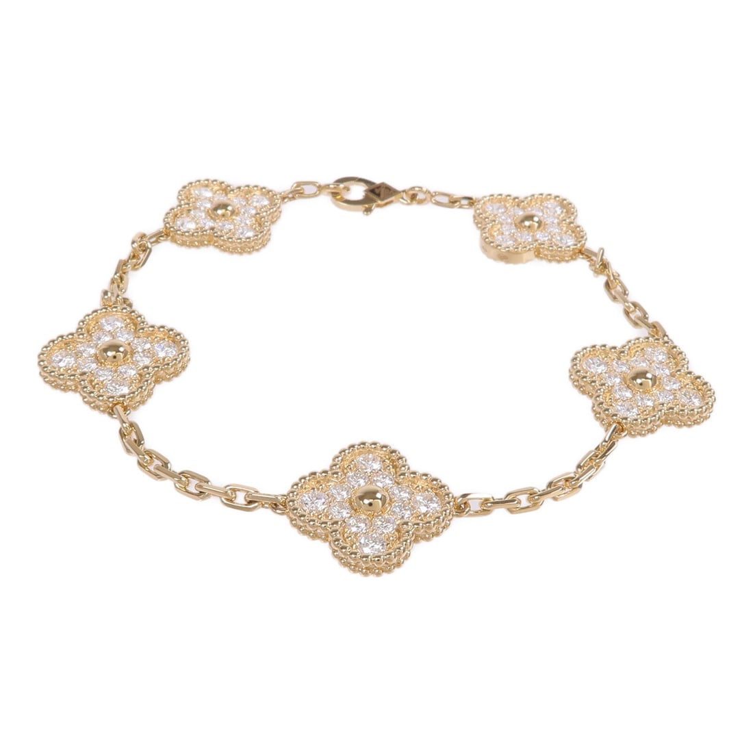 Vintage Alhambra 5 Motif Diamond Bracelet in 18K Yellow Gold by Van Cleef & Arpels: Vintage Alhambra 5 Motif Diamond Bracelet in 18K Yellow Gold by Van Cleef & Arpels This Van Cleef & Arpels Vintage Alhambra bracelet features five motifs crafted in 18K yellow gold and is adorned with