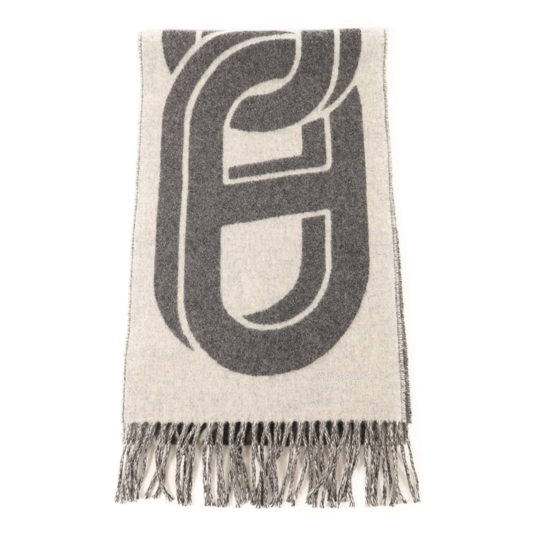 Gray Cashmere Scarf by HERMES for Women: Gray Cashmere Scarf by HERMES for Women This women's scarf is crafted from soft cashmere in a versatile gray color. Made in France, it offers a luxurious and comfortable accessory suitable for various