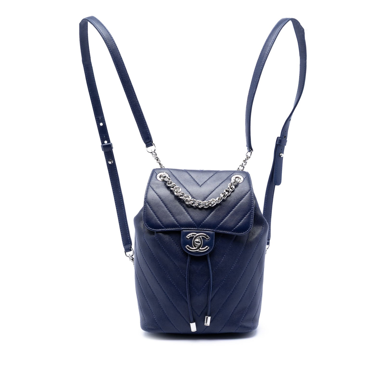 Chanel Urban Spirit Mini Chevron Blue Lambskin Quilted Backpack with Silver Chain: Chanel Urban Spirit Mini Chevron Blue Lambskin Quilted Backpack with Silver Chain This Chanel Mini Chevron Lambskin Urban Spirit Backpack features a quilted lambskin leather body in blue, complemented