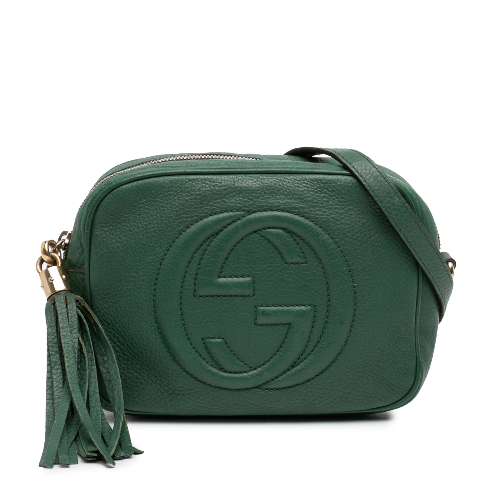 Green Leather Soho Disco Crossbody Bag with Tassel by Gucci: Green Leather Soho Disco Crossbody Bag with Tassel by Gucci This Gucci Soho Disco Crossbody bag features a green leather body and an adjustable flat leather strap. The bag includes a tassel detail, a