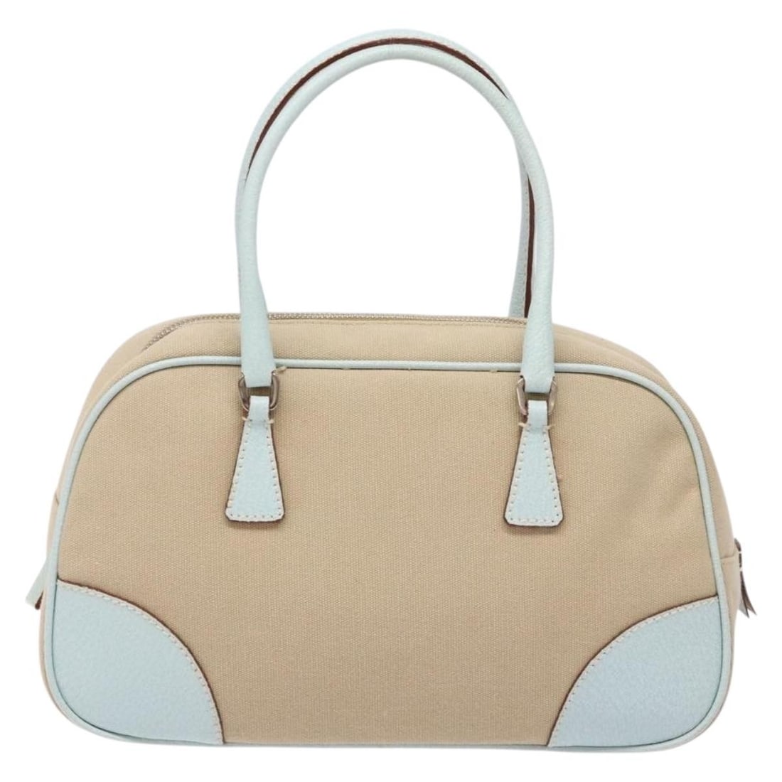 Prada Bauletto Beige Canvas and Leather Handbag 25cm: Prada Bauletto Beige Canvas and Leather Handbag 25cm This Prada Bauletto bag is crafted from beige canvas with leather accents. Designed for women, it features a structured silhouette with top handles