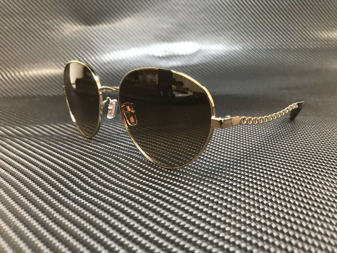 Coach HC7114 9005U7 Light Gold Women's Sunglasses with Dark Brown Gradient Lenses (1 of 4)