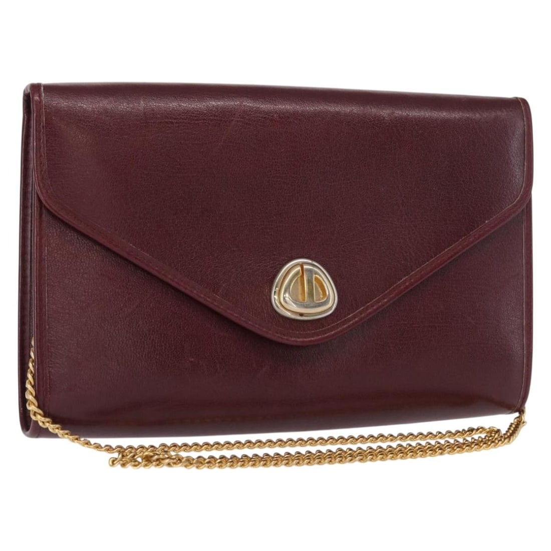 Christian Dior Burgundy Leather Vintage Chain Flap Shoulder Bag: Christian Dior Burgundy Leather Vintage Chain Flap Shoulder Bag This Christian Dior vintage chain flap shoulder bag features a burgundy leather exterior with a classic chain strap design. The bag is d