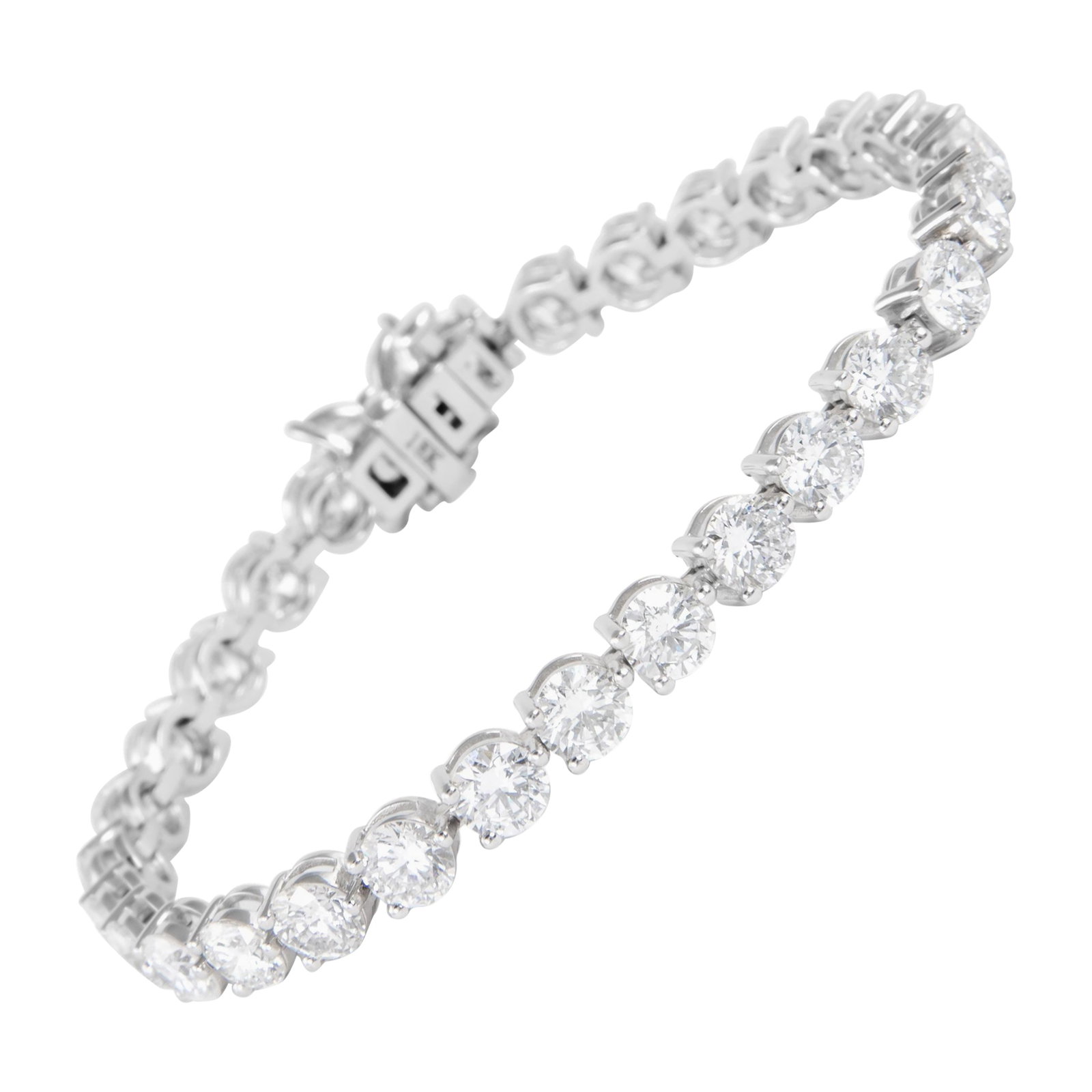 12.53ct Diamond Tennis Bracelet 18k White Gold: 12.53ct Diamond Tennis Bracelet 18k White Gold This stunning 12.53ct Diamond Three-Prong Tennis Bracelet is crafted in luxurious 18k white gold, showcasing a classic and elegant design. It features 29