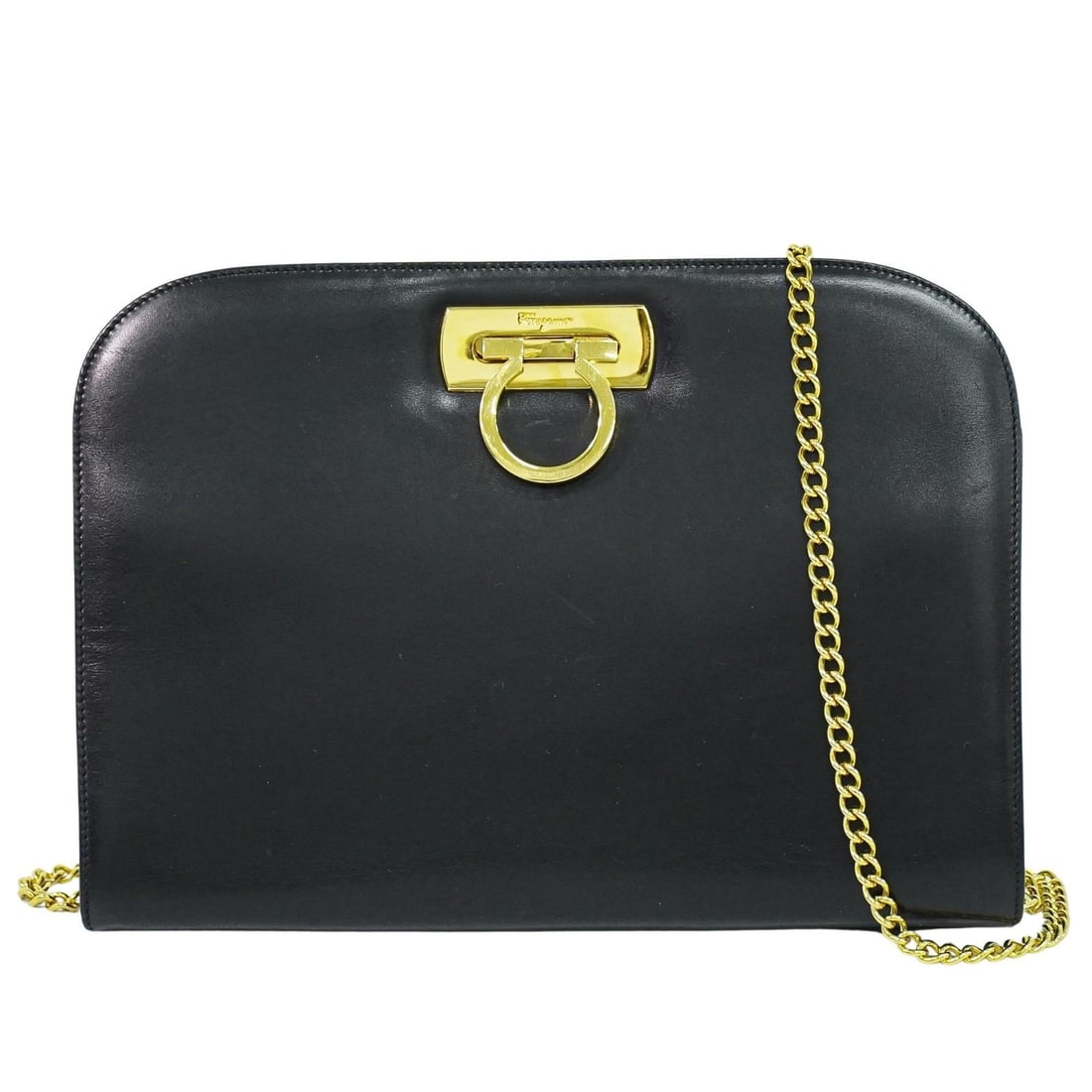 Leather Shoulder Bag with Gancini Chain by Salvatore Ferragamo Vintage: Leather Shoulder Bag with Gancini Chain by Salvatore Ferragamo Vintage This vintage Salvatore Ferragamo Gancini chain shoulder bag is crafted from black leather. Designed for women, it features a clas