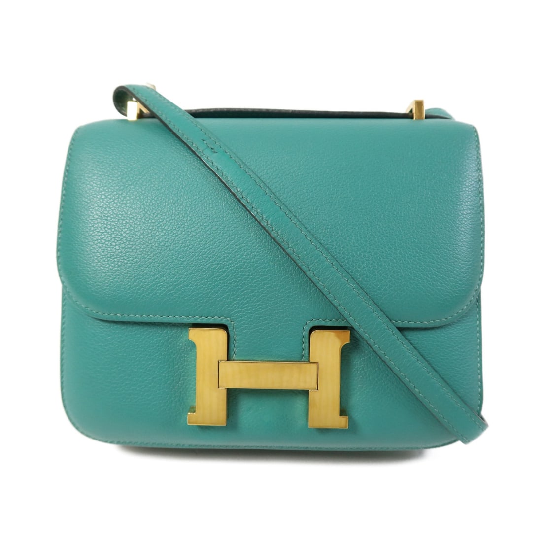 Hermes Constance Mini Green Evercolor Leather Shoulder Bag with Gold Hardware: Hermes Constance Mini Green Evercolor Leather Shoulder Bag with Gold Hardware This Hermes Constance Mini shoulder bag is crafted from Evercolor calfskin leather in a vibrant Vert Vertigo green hue. Th