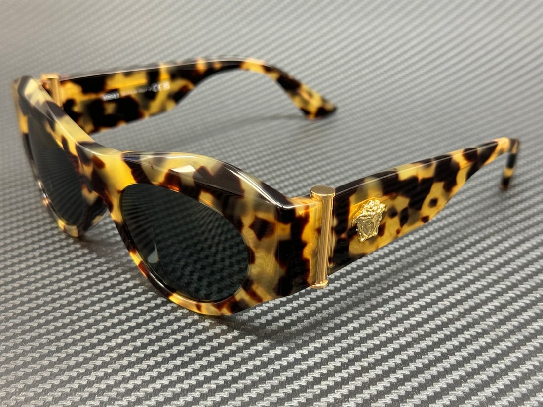 Versace VE4477U 777 87 Brown Yellow Sunglasses with Grey Lenses: Versace VE4477U 777 87 Brown Yellow Sunglasses with Grey Lenses Elevate your style with these stunning Versace VE4477U 777 87 sunglasses. Featuring a chic brown and yellow frame, these sunglasses are 