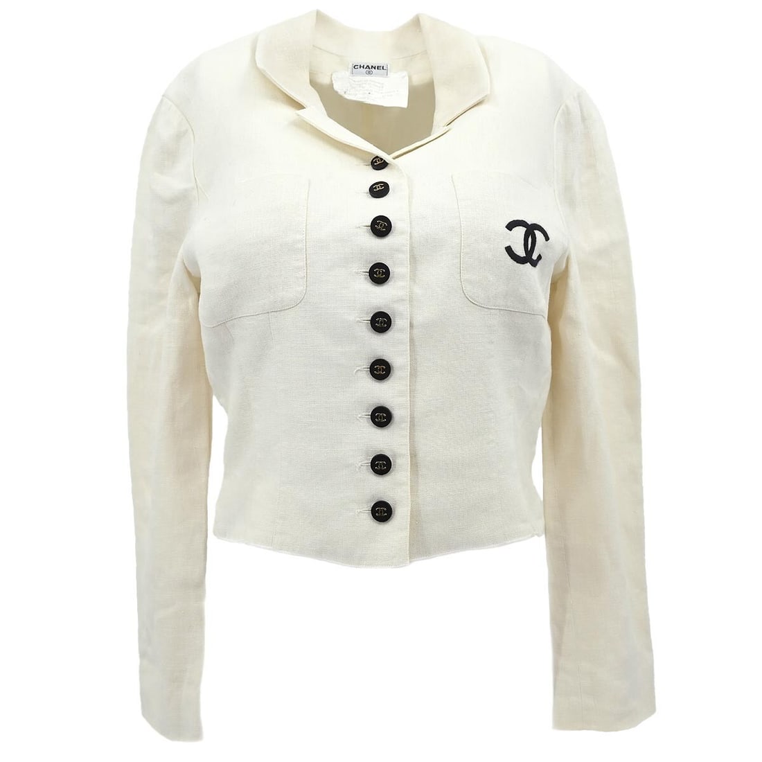Chanel Vintage White Linen Single Breasted Jacket 03619H: Chanel Vintage White Linen Single Breasted Jacket 03619H This elegant Chanel single-breasted jacket is crafted from 100% linen, offering a breathable and stylish option for various occasions. Featurin