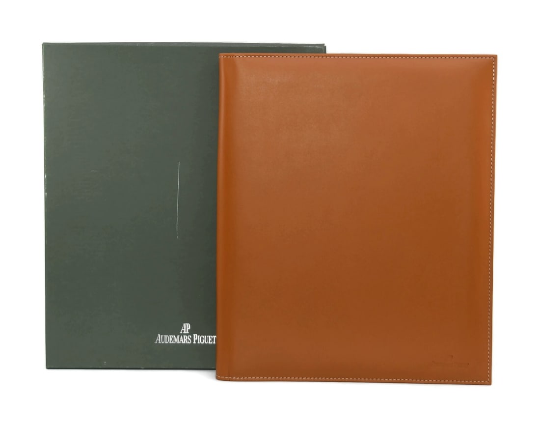Audemars Piguet Authentic Brown Portfolio Presentation Box 12 x 10 Inches: Audemars Piguet Authentic Brown Portfolio Presentation Box 12 x 10 Inches This Audemars Piguet Brown Portfolio Folder is a luxurious presentation box designed for sophistication. Crafted by the renown