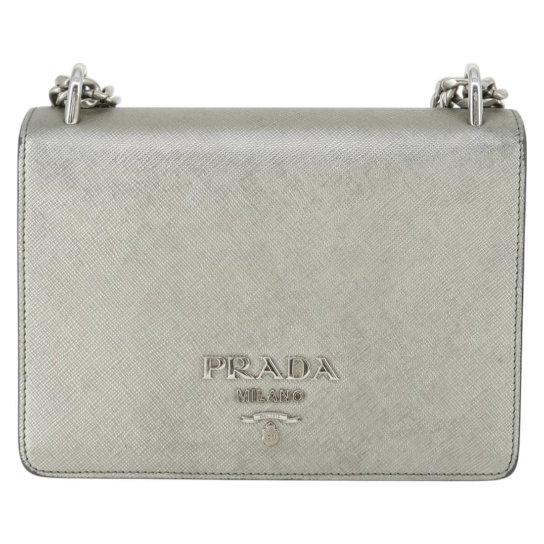 Prada Silver Leather Chain Flap Shoulder Bag 20cm by 13cm by 7cm: Prada Silver Leather Chain Flap Shoulder Bag 20cm by 13cm by 7cm This Prada Chain Flap Bag for women is crafted from silver saffiano leather with a chain shoulder strap. The bag measures 20cm x 13cm x