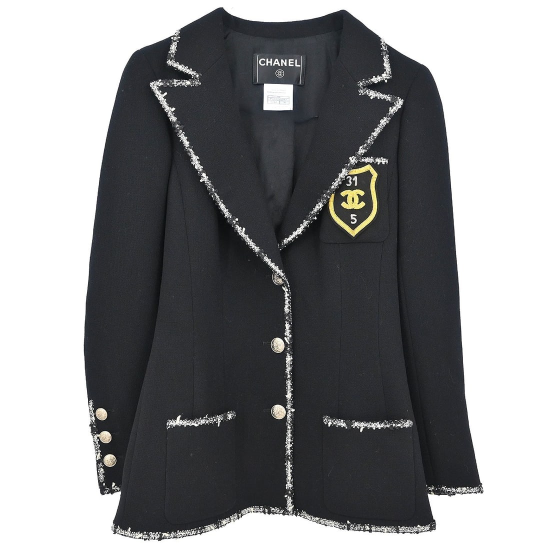 Chanel Vintage Black Wool Single Breasted Jacket 05C #36: Chanel Vintage Black Wool Single Breasted Jacket 05C #36 This exquisite Chanel single-breasted jacket is crafted from 100% wool, offering both style and comfort. The mid-length design is perfect for b