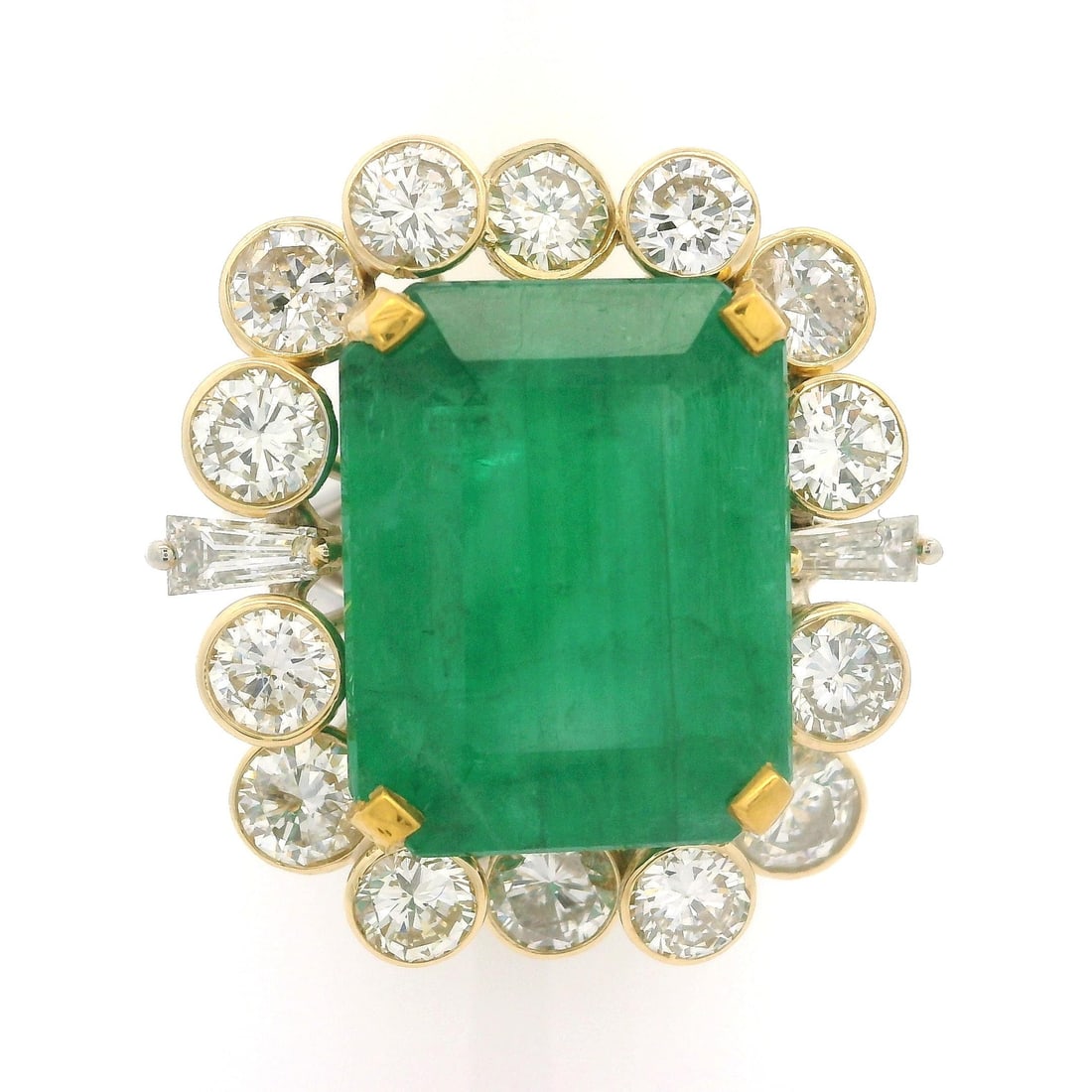 Handmade Gold 11.38ctw GIA No Oil Emerald Diamond Halo Ring: Handmade Gold 11.38ctw GIA No Oil Emerald Diamond Halo Ring Discover this exquisite handmade cocktail ring featuring a stunning GIA-certified emerald. The ring showcases a magnificent octagonal step-c