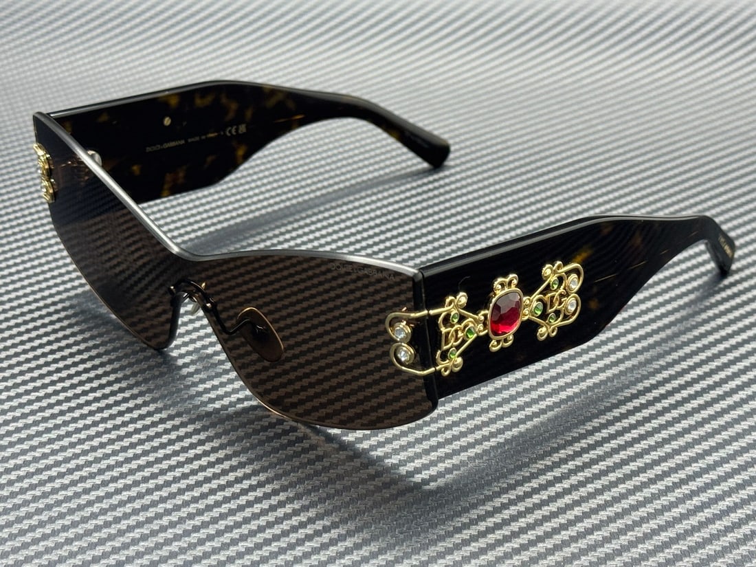 Dolce & Gabbana DG4526B Havana 70mm Dark Brown Women's Sunglasses with Case: Dolce & Gabbana DG4526B Havana 70mm Dark Brown Women's Sunglasses with Case These Dolce & Gabbana women's sunglasses feature a Havana-colored frame with dark brown lenses. The model DG4526B 502 73 off