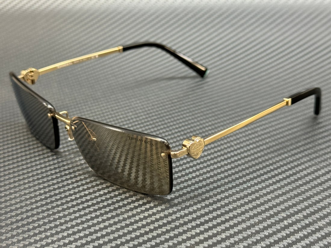 Tiffany TF3108B 60215A Pale Gold Brown Mirror Sunglasses: Tiffany TF3108B 60215A Pale Gold Brown Mirror Sunglasses These Tiffany & Co. TF3108B 60215A sunglasses feature a chic pale gold frame complemented by brown mirror lenses, perfect for adding a touch of