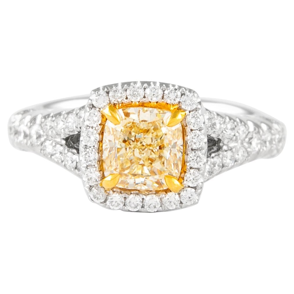 1.76ct Fancy Yellow VVS2 Halo Ring 18k Gold: 1.76ct Fancy Yellow VVS2 Halo Ring 18k Gold This exquisite 1.76ctt Fancy Yellow VVS2 Cushion Diamond Halo Ring is crafted in luxurious 18k two-tone gold, featuring both yellow and white gold. The cent