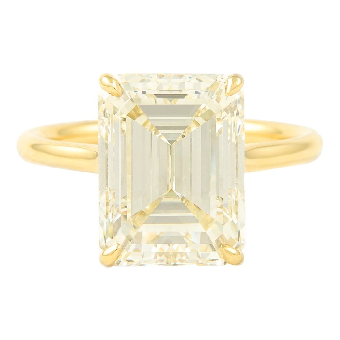 IGI 6.05ct Emerald Cut Diamond Ring 18k Yellow Gold: IGI 6.05ct Emerald Cut Diamond Ring 18k Yellow Gold This stunning modern solitaire ring features a 6.05 carat emerald cut diamond, expertly graded by IGI with an L color grade and VVS2 clarity. Crafte