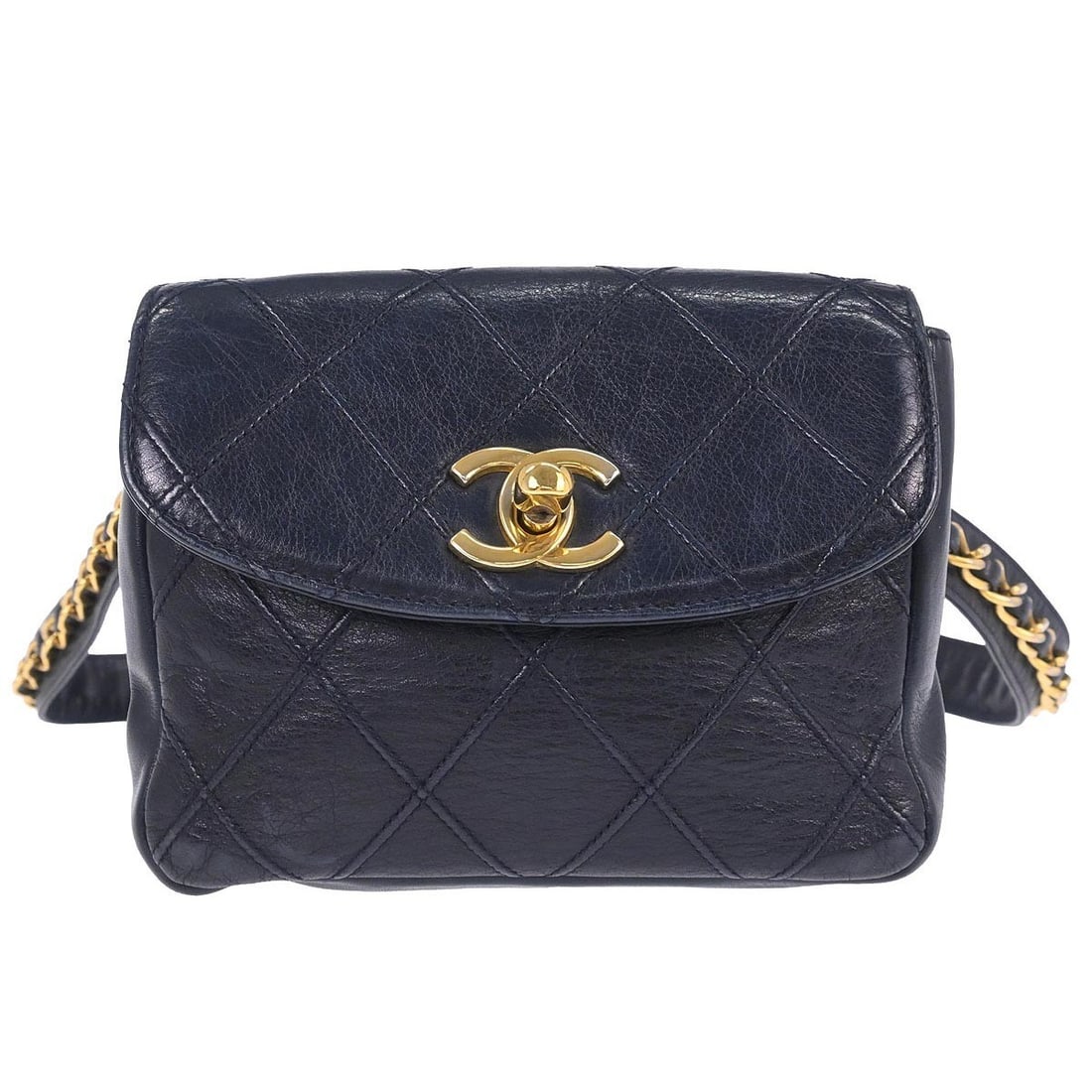 Chanel Navy Leather Vintage Flap Belt Bag for Women: Chanel Navy Leather Vintage Flap Belt Bag for Women This is a Chanel Vintage Flap Waist Bag crafted from navy leather, designed for female use. Made in Italy, the bag features metal fittings and shows